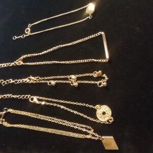 5 gold tone bracelets crystal ,stars ,dots ,bars all measure 8in